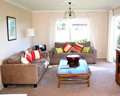 Spacious apartment accommodation living area at Pacific Palms Resort, Mt Maunganui
