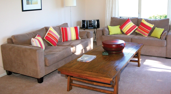 Lounge of a 2 bedroom apartment at Pacific Palms Resort in Papamoa, Tauranga